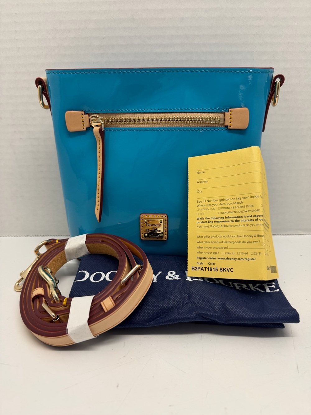 Dooney & Bourke Patent Leather Small Zip Crossbody
